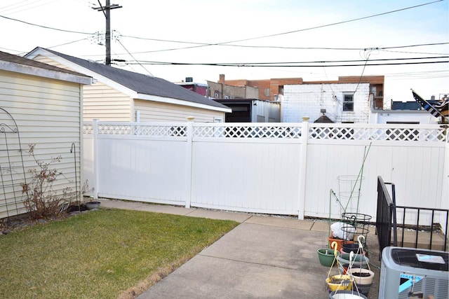 view of yard featuring a fenced backyard and a patio