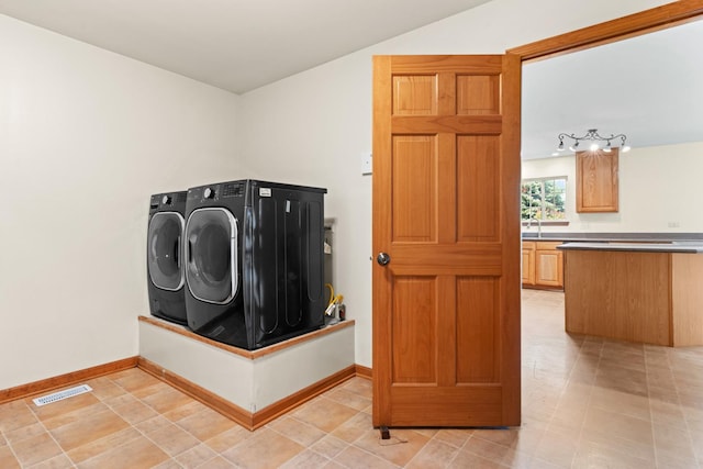 968 Pattee Ave, Elburn, IL 60119 - laundry area featuring separate washer and dryer and baseboards