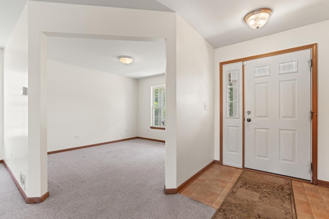 968 Pattee Ave, Elburn, IL 60119 - entrance foyer featuring baseboards and light carpet