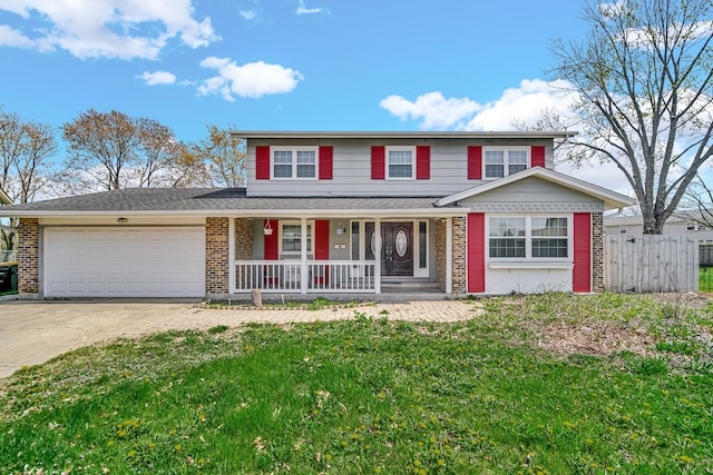 127 Tottenham Ln, Elk Grove Village, IL 60007 - traditional-style house with a porch, a garage, driveway, brick siding, and fence