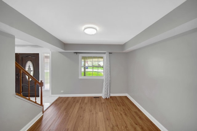 127 Tottenham Ln, Elk Grove Village, IL 60007 - interior space featuring baseboards, stairway, wood finished floors, and visible vents