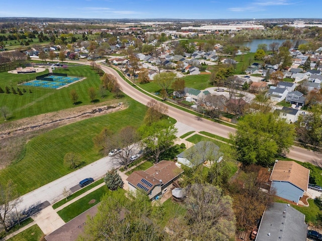 aerial view featuring a water view and a residential view