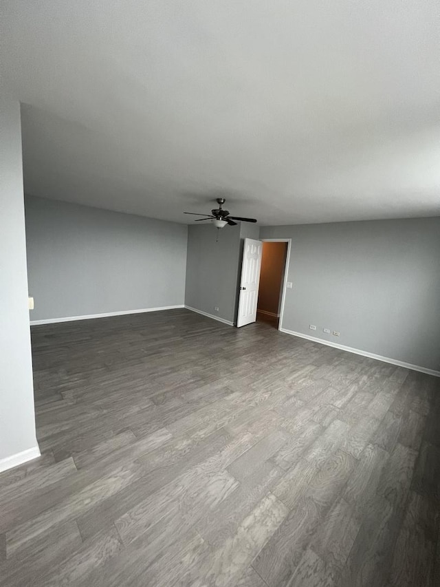 6150 N Kenmore Ave Unit 15B, Chicago, IL 60660 - spare room with a ceiling fan, baseboards, and dark wood-style flooring