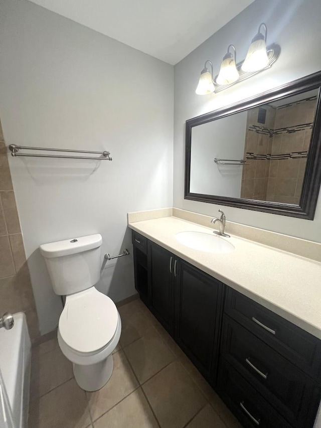 6150 N Kenmore Ave Unit 15B, Chicago, IL 60660 - full bathroom featuring vanity, tile patterned floors, toilet, a tub to relax in, and a shower