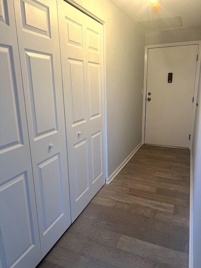 6150 N Kenmore Ave Unit 15B, Chicago, IL 60660 - hall with dark wood-style flooring and baseboards