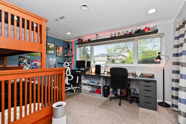 office area featuring carpet floors, recessed lighting, and visible vents