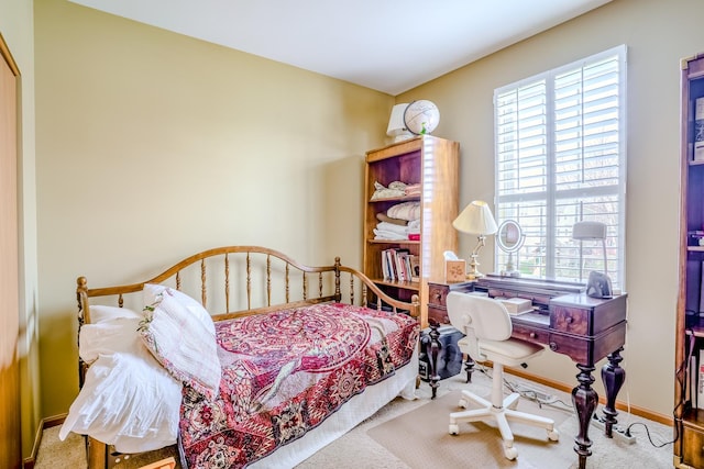 bedroom featuring baseboards