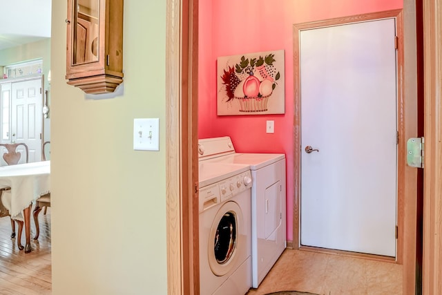 laundry room featuring washer and clothes dryer