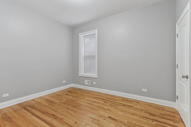 3220 W Polk St, Chicago, IL 60624 - spare room with light wood-type flooring and baseboards