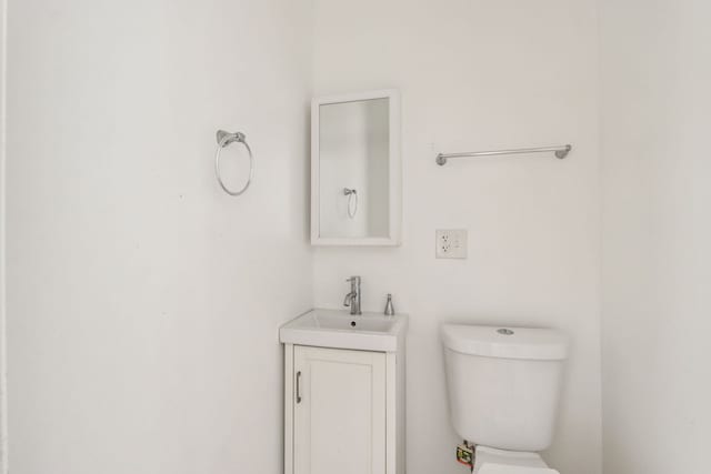 3220 W Polk St, Chicago, IL 60624 - bathroom featuring vanity and toilet