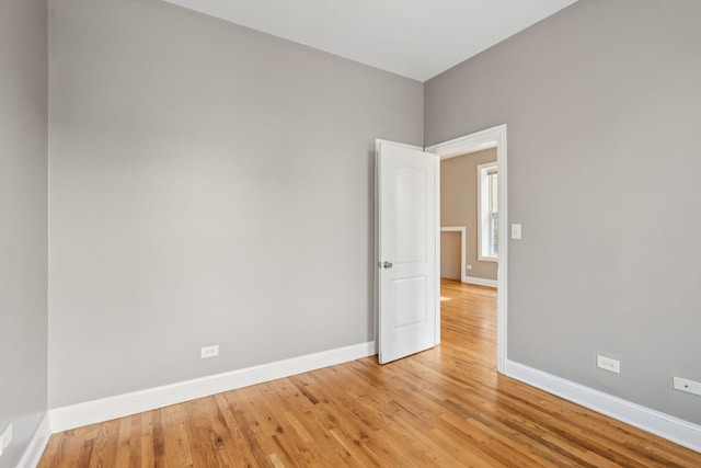 3220 W Polk St, Chicago, IL 60624 - unfurnished room featuring baseboards and light wood-type flooring