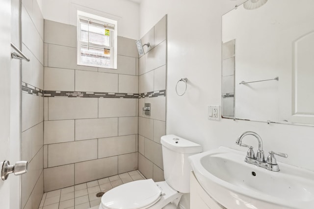 3220 W Polk St, Chicago, IL 60624 - bathroom featuring toilet, tiled shower, and vanity