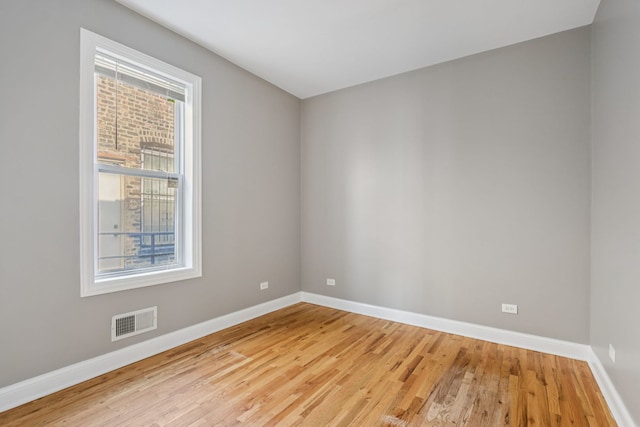 3220 W Polk St, Chicago, IL 60624 - unfurnished room with baseboards and wood finished floors