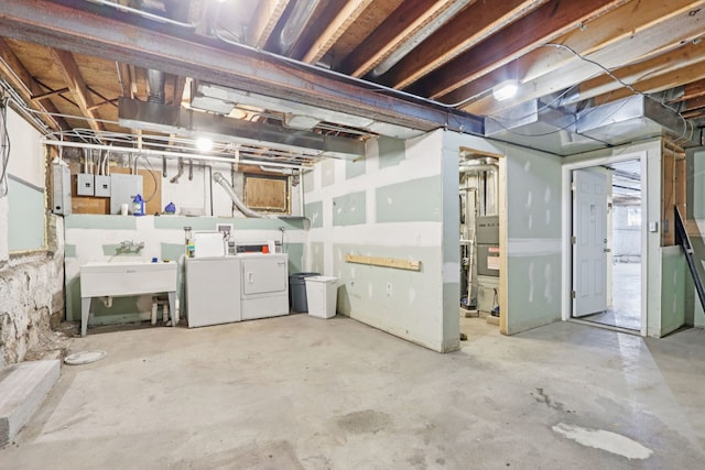 3220 W Polk St, Chicago, IL 60624 - unfinished basement featuring washing machine and clothes dryer and a sink