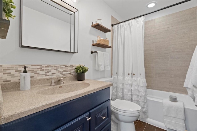 24860 W Forest Dr, Lake Villa, IL 60046 - full bath with vanity, toilet, shower / bath combo with shower curtain, and tasteful backsplash