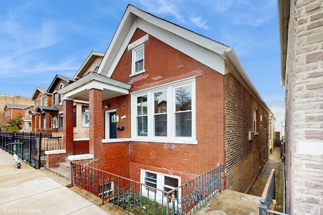 view of front of property featuring brick siding