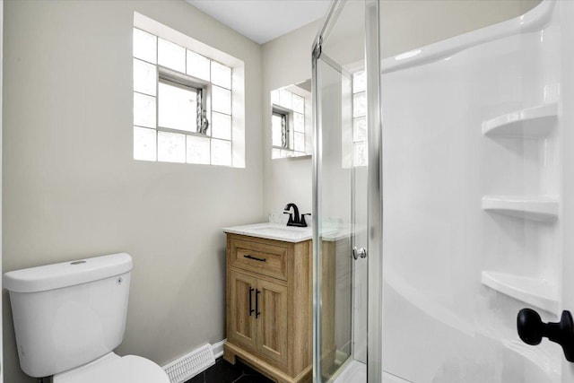 10854 S Union Ave, Chicago, IL 60628 - full bath with a shower stall, vanity, toilet, and baseboards