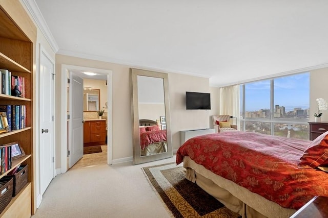 1555 N Dearborn Pkwy Unit 25Ab, Chicago, IL 60610 - bedroom with baseboards, crown molding, connected bathroom, and light colored carpet