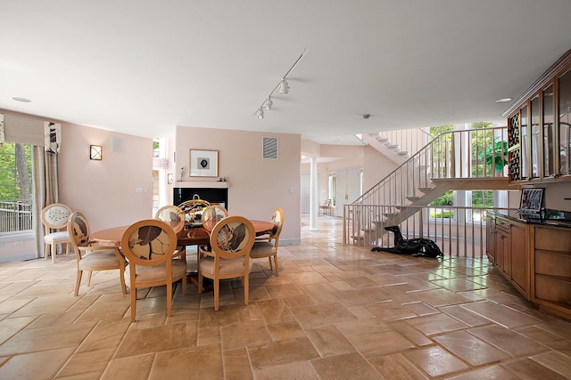 621 Chatfield Rd, New Lenox, IL 60451 - dining space with healthy amount of natural light, stairway, and track lighting