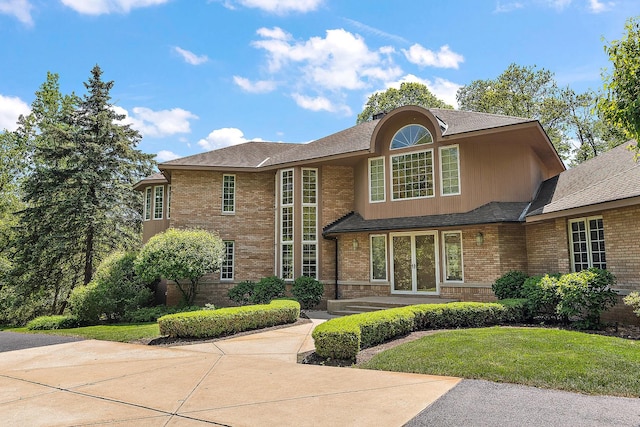 621 Chatfield Rd, New Lenox, IL 60451 - traditional home with brick siding, a front lawn, and roof with shingles