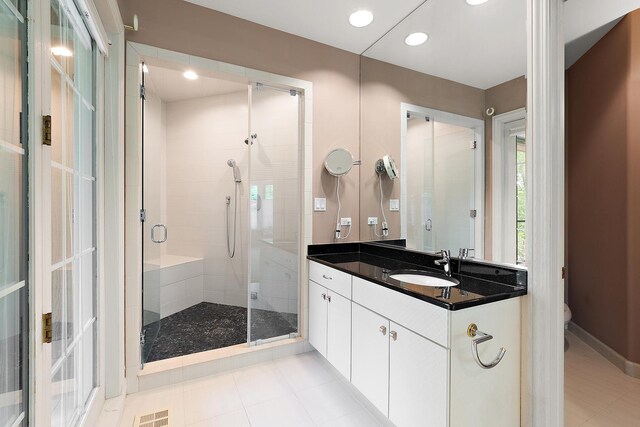 621 Chatfield Rd, New Lenox, IL 60451 - full bathroom featuring a shower stall, vanity, toilet, recessed lighting, and tile patterned floors