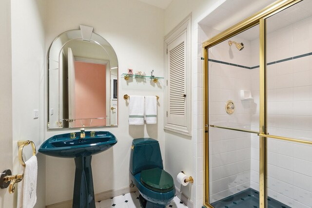 621 Chatfield Rd, New Lenox, IL 60451 - bathroom with toilet, a shower stall, baseboards, and a sink