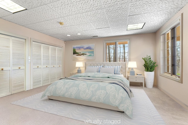 621 Chatfield Rd, New Lenox, IL 60451 - bedroom featuring carpet floors, multiple closets, and baseboards