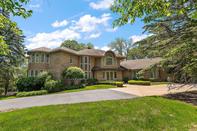 621 Chatfield Rd, New Lenox, IL 60451 - view of front of house featuring a front yard, brick siding, and concrete driveway