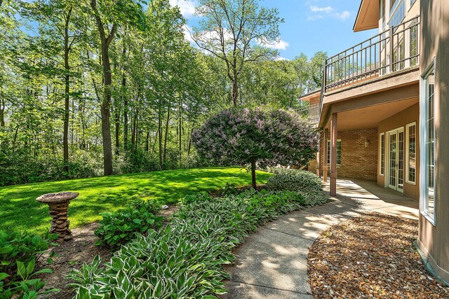 621 Chatfield Rd, New Lenox, IL 60451 - view of grassy yard featuring a balcony