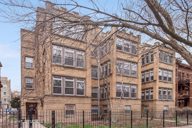 view of property featuring a fenced front yard