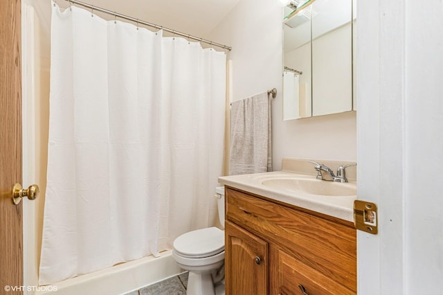 full bath featuring vanity, tile patterned flooring, a shower with shower curtain, and toilet