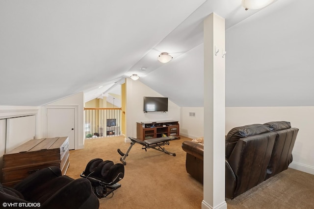 bonus room featuring carpet flooring, visible vents, baseboards, and vaulted ceiling