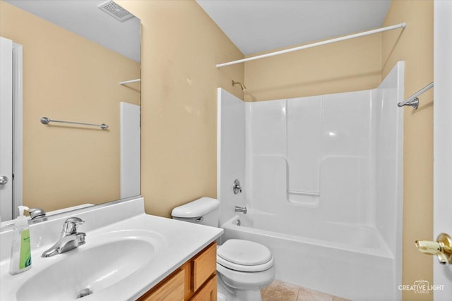 full bathroom featuring washtub / shower combination, vanity, tile patterned floors, toilet, and visible vents