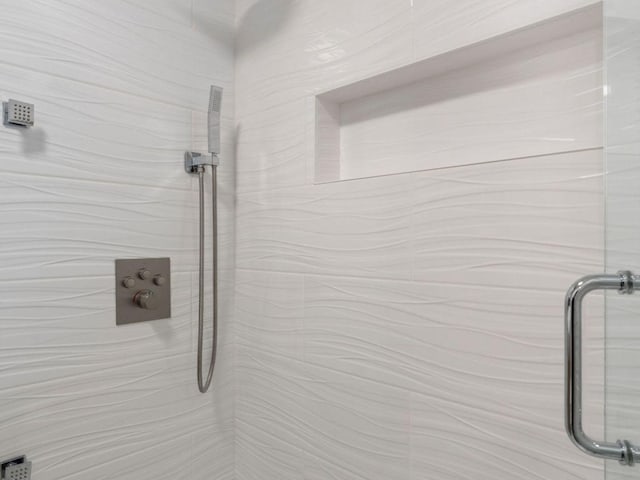 1355 N Sandburg Ter Unit 906D, Chicago, IL 60610 - full bathroom featuring a tile shower