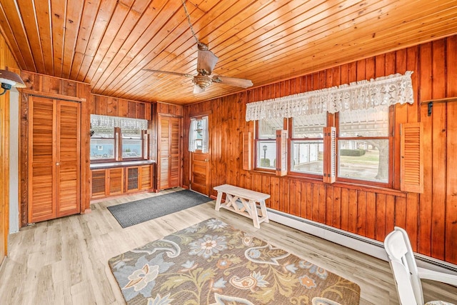 2513 Woods St, West Brooklyn, IL 61378 - living area with wood walls, wood finished floors, wood ceiling, and a ceiling fan