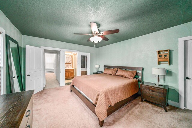 2513 Woods St, West Brooklyn, IL 61378 - bedroom with a ceiling fan, light carpet, ensuite bath, and a textured ceiling