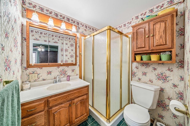 2513 Woods St, West Brooklyn, IL 61378 - full bathroom featuring wallpapered walls, vanity, toilet, and a shower stall