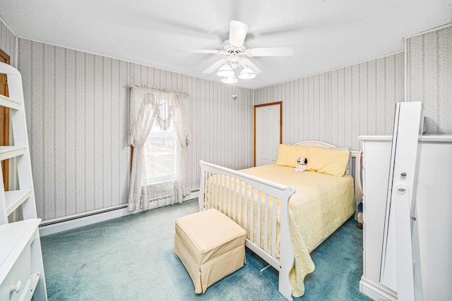 2513 Woods St, West Brooklyn, IL 61378 - carpeted bedroom with baseboard heating, wallpapered walls, and a ceiling fan