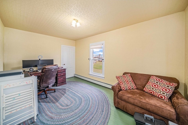 2513 Woods St, West Brooklyn, IL 61378 - home office featuring a baseboard heating unit and a textured ceiling
