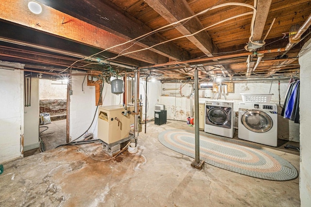 2513 Woods St, West Brooklyn, IL 61378 - unfinished below grade area featuring washing machine and clothes dryer and a heating unit