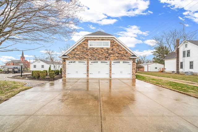 2513 Woods St, West Brooklyn, IL 61378 - exterior space with stone siding, a lawn, and concrete driveway