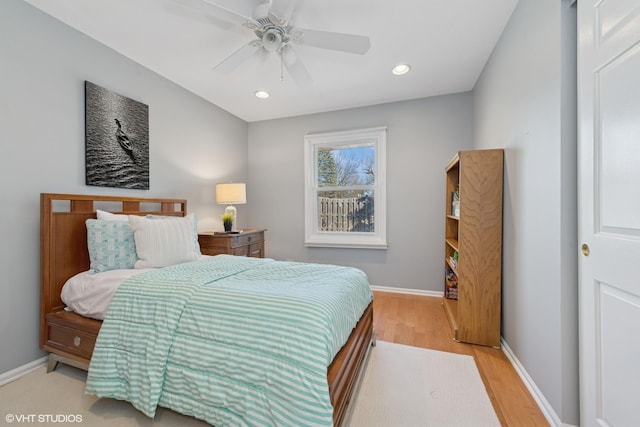 bedroom featuring baseboards, wood finished floors, recessed lighting, and a ceiling fan