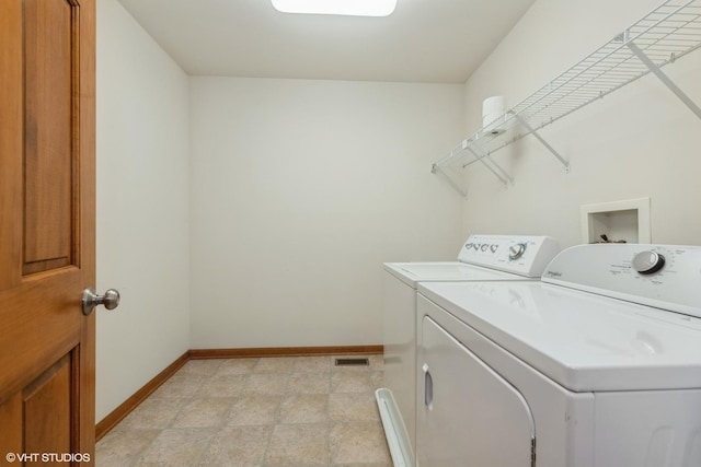 2835 Cattail Ct Unit B, Wauconda, IL 60084 - laundry room featuring separate washer and dryer and baseboards