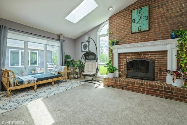 1485 Lexington Rd, Green Oaks, IL 60048 - sitting room featuring carpet floors, vaulted ceiling, a skylight, and a brick fireplace