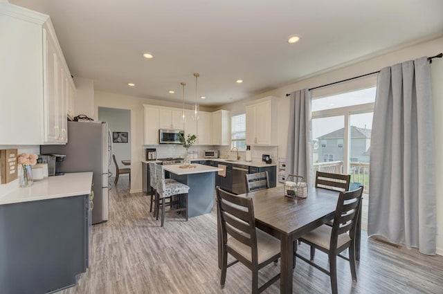 2034 Ingemunson Ln, Yorkville, IL 60560 - dining space with light wood finished floors and recessed lighting