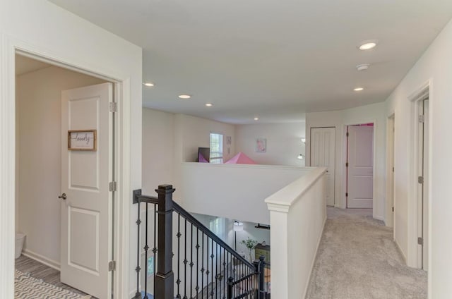 2034 Ingemunson Ln, Yorkville, IL 60560 - hall featuring an upstairs landing, recessed lighting, light colored carpet, and baseboards