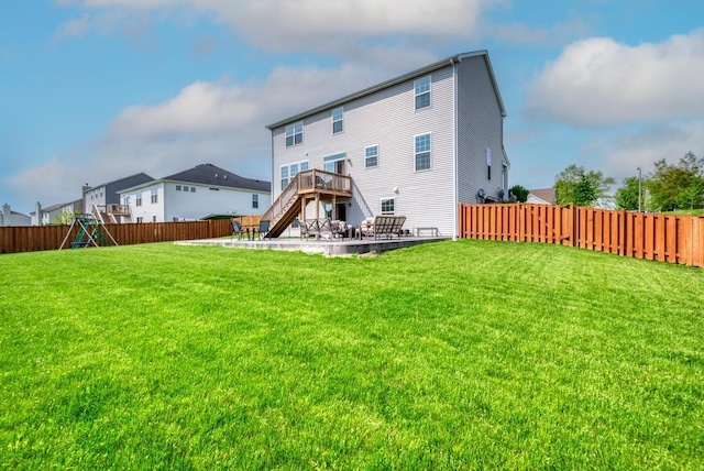 2034 Ingemunson Ln, Yorkville, IL 60560 - rear view of house with stairs, a playground, and a deck
