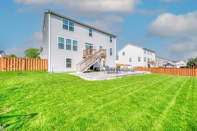 2034 Ingemunson Ln, Yorkville, IL 60560 - rear view of property featuring stairs, a patio, and a deck