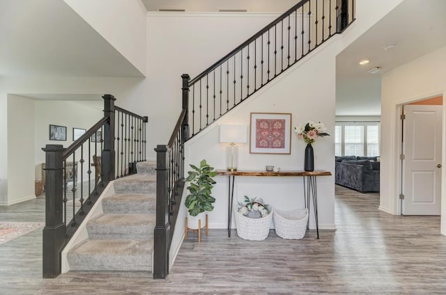 2034 Ingemunson Ln, Yorkville, IL 60560 - stairs with wood finished floors, a high ceiling, and baseboards