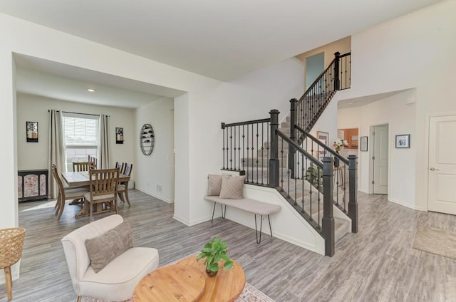 2034 Ingemunson Ln, Yorkville, IL 60560 - living area with wood finished floors, stairway, and baseboards
